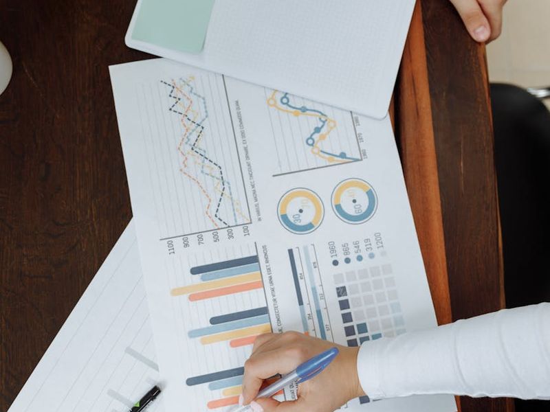 Business consultant conducting comprehensive process analysis with charts and diagrams