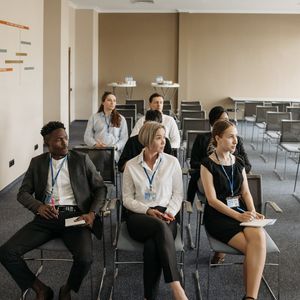 Woman in business attire representing senior training specialist