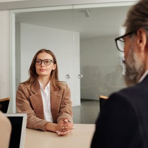 Woman in professional attire representing strategic planning expert