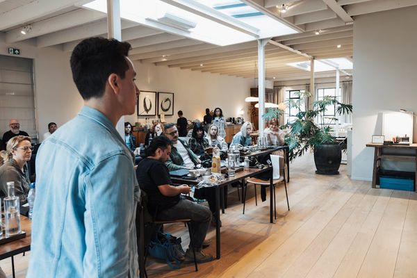 Workshop participants engaged in interactive change management training exercise